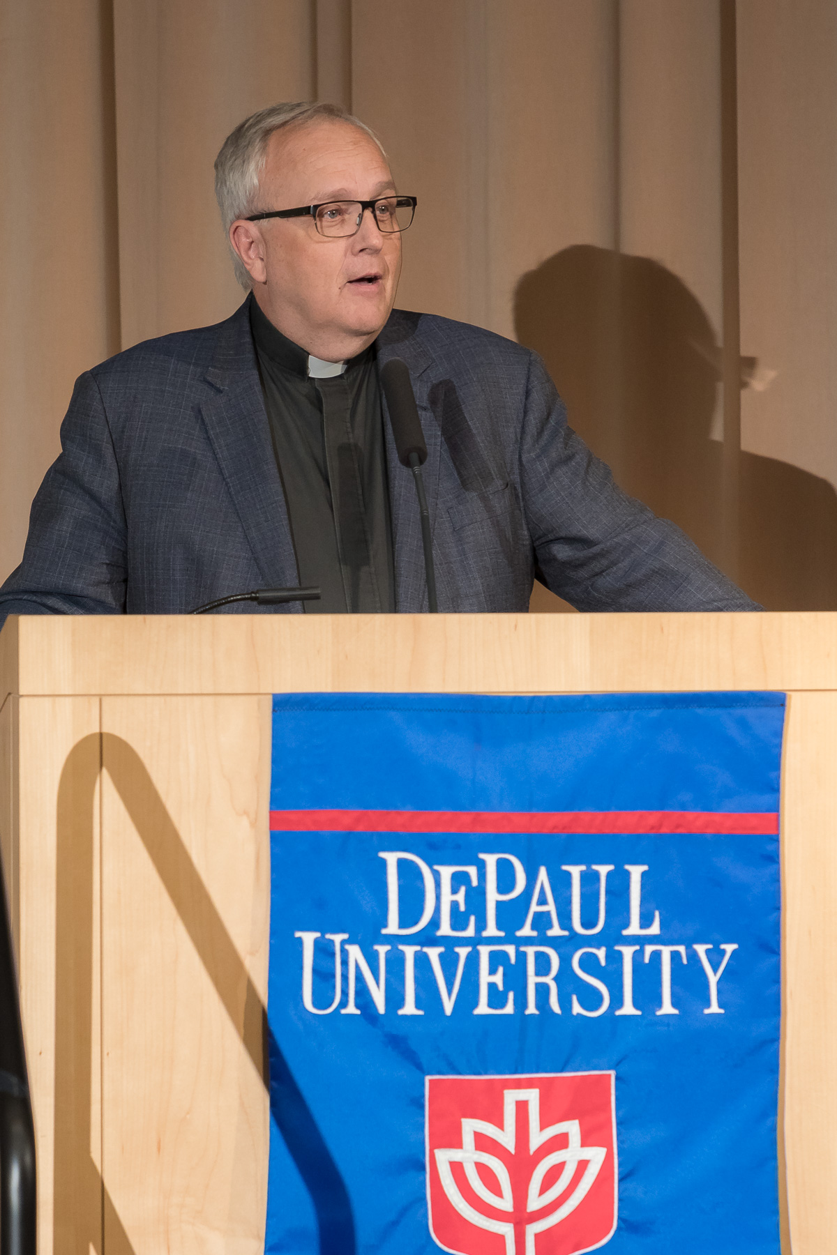 The Rev. Edward R. Udovic, C.M., secretary of the University, offers and invocation as DePaul University faculty and staff members are honored for their 25 years of service during a luncheon, Tuesday, Nov. 13, 2018, at the Lincoln Park Student Center. The honorees were recognized by A. Gabriel Esteban, Ph.D., president of DePaul, and will have their names added to plaques located on the Loop and Lincoln Park Campuses. (DePaul University/Jeff Carrion)